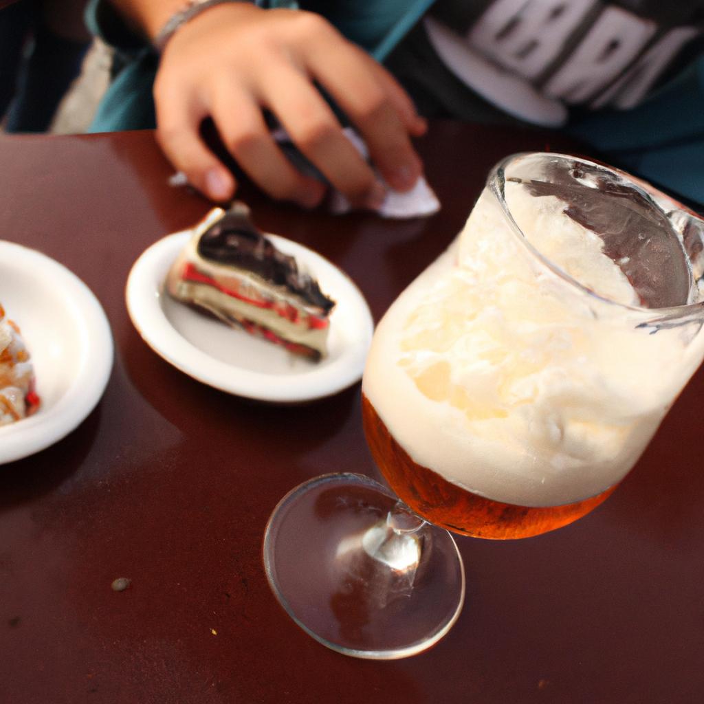 Person tasting beer and dessert