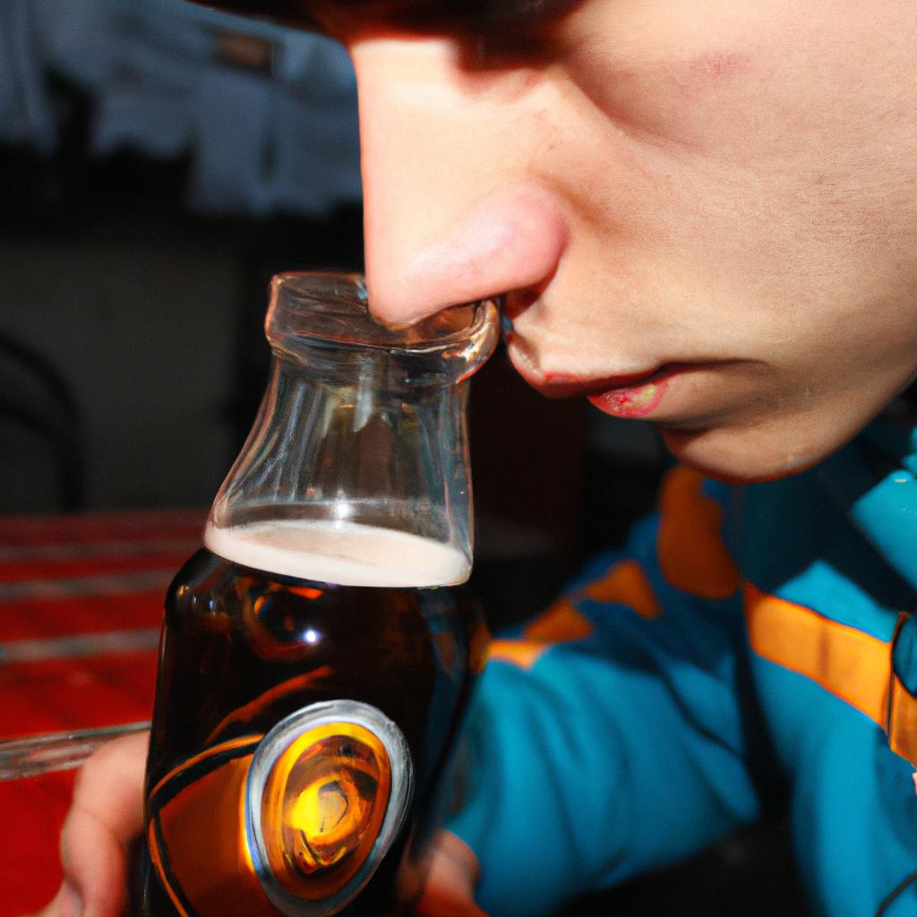 Person sniffing beer for review
